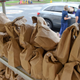 A rack with bags containing grab-and-go breakfasts and lunches at the Muhlenberg Elementary Center in Muhlenberg twp, PA, Thursday morning, September 10, 2020, where school district employees were distributing grab-and-go meals to students.